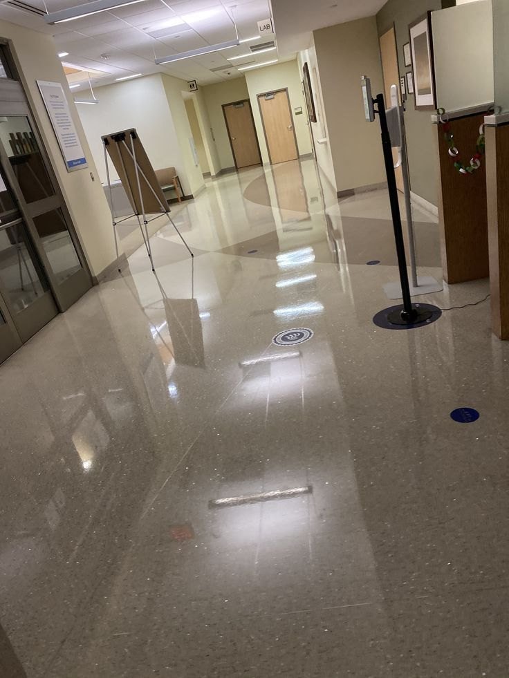Polished corridor floor shining in a commercial building